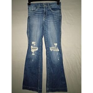 Women’s Distressed Blue Flared Jeans